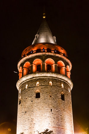Galata Tower in istanbul at night view.  The tower has an external diameter of 16.45 meters at the base, an 8.95 meters diameter inside, and walls that are 3.75 meters thickのeditorial素材