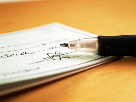 Writing a checkの写真素材