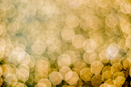 many glowing unscarbe yellow round lightsの写真素材