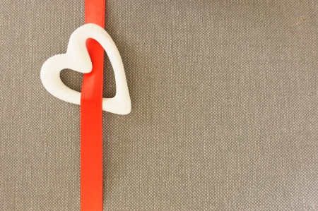 white heart on red tapeの写真素材