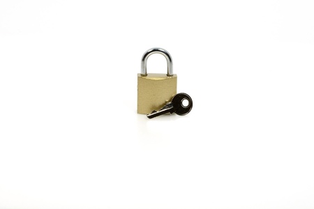Lock and Key against white backgroundの写真素材