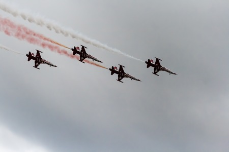 TURKEY, ESKİŞEHİR - 21 SEPTEMBER 2014 - On the occasion of the 103 anniversary of the Turkish Air Force, The Solo Turk and Turkish Stars Aerobatic Teams made a breathtaking Air Showのeditorial素材
