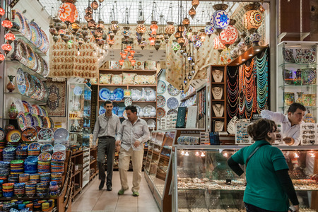 ISTANBUL - OCTOBER 8 : People shopping in the Grand Bazar on October 8, 2009 in Istanbul, Turkey....