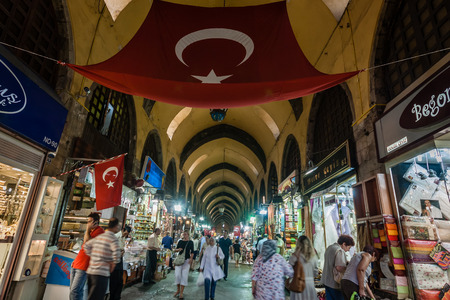 ISTANBUL - SEPTEMBER 3 : People shopping in the Grand Bazar on September 3, 2008 in Istanbul, Turkey. Bazaar was built in 1664.のeditorial素材