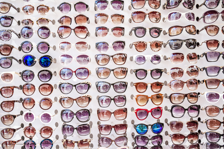 MUGLA , TURKEY - AUGUST 29, 2015: Colorful Sunglasses on sale at city marketのeditorial素材