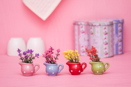 Colorful small decorative artificialplants in colorful potsの写真素材