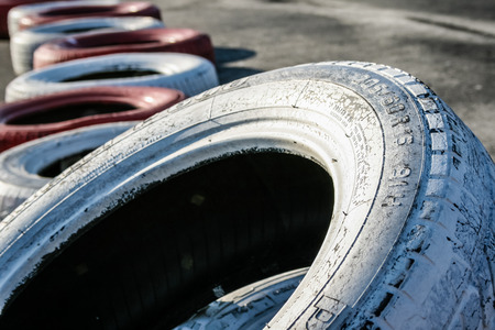 ISTANBUL, TURKEY - DEC 23, 2007:  Painted used old tires recycled as barrier