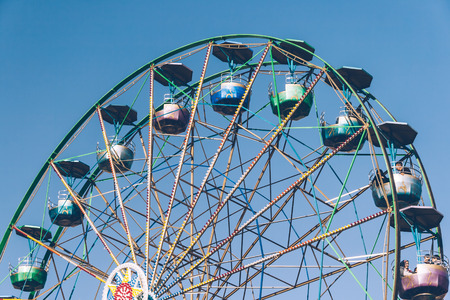 ESKISEHIR, TURKEY - NOV 20, 2010: Machines in an amusement park under clear blue skyのeditorial素材