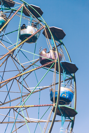 ESKISEHIR, TURKEY - NOV 20, 2010: Machines in an amusement park under clear blue skyのeditorial素材