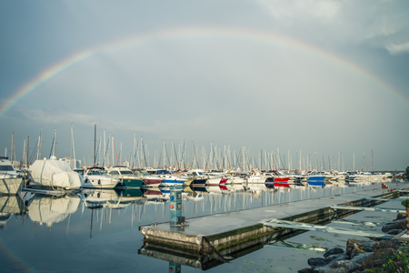ISTANBUL, TURKEY - JUN 06, 2012:  Pendik harbor with sailboats and rainbow in Istanbulのeditorial素材
