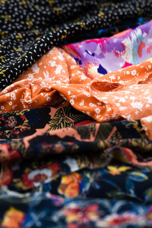 Cloths with different designs at street bazaar