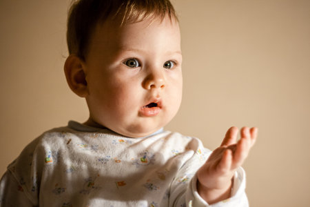 Cute newborn baby sleeping in colorful bed, natural lookの写真素材