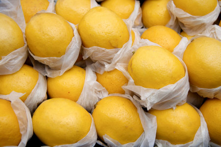 Fresh, juicy lemons in market, healthy eating and rich in vitamins.の写真素材