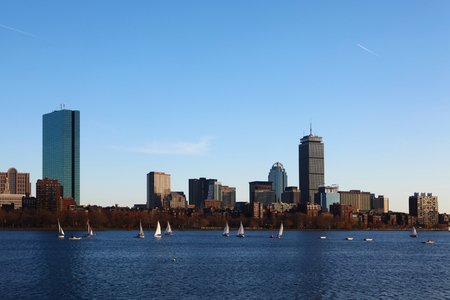 The Boston, Massachusetts skyline with sailboats in frontのeditorial素材