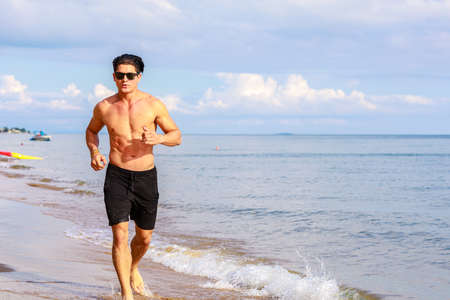 Man running on the beach