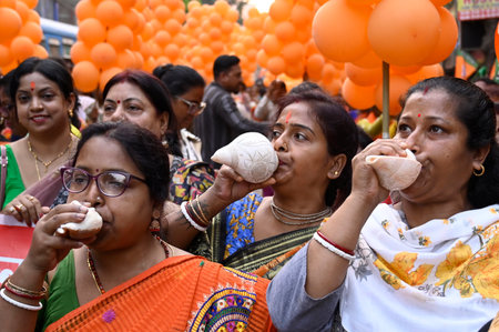 KOLKATA, INDIA - APRIL 9:  Bharatiya Janata Party (BJP) supporters blow conch during election...