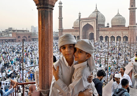 NEW DELHI, INDIA - APRIL 11:  Children greet each other at the Jama Masjid on the occasion of the Eid-ul-Fitr festival,  on April 11, 2024 in New Delhi, India.  (Photo by Sanjeev Verma/Hindustan Times)のeditorial素材
