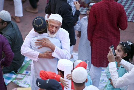 NEW DELHI, INDIA - APRIL 11:  People from the Muslim community greet each other at the Jama Masjid on the occasion of the Eid-ul-Fitr festival,  on April 11, 2024 in New Delhi, India.  (Photo by Sanjeev Verma/Hindustan Times)のeditorial素材