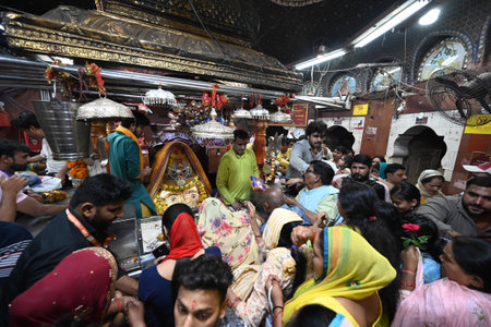 NEW DELHI, INDIA - APRIL 11:  Heavy rush Devotees line and offering prayer at Kalka ji Mandir (Temple) at Nehru Place during the ongoing Navratri festival  on April 11, 2024 in New Delhi, India.  (Photo by Sonu Mehta/Hindustan Times)のeditorial素材