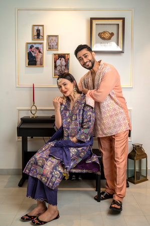 MUMBAI, INDIA - APRIL 5: (EDITOR'S NOTE: This is an exclusive image of Hindustan Times) Bollywood actor Gauahar Khan with actor, Social Media Influencer and her husband Zaid Darbar pose during an exclusive interview with HT City on the occasion of Eid fesのeditorial素材