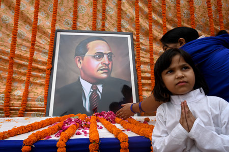 NOIDA, INDIA - APRIL 14: People offer floral tributes on the occasion of the 133th birth anniversary of Dalit icon BR Ambedkar at Rashtriya Dalit Prerna Sthal, sector 95, on April 14, 2024 in Noida, India. Every year, on April 14, Dr Bhimrao Ramji Ambedkaのeditorial素材