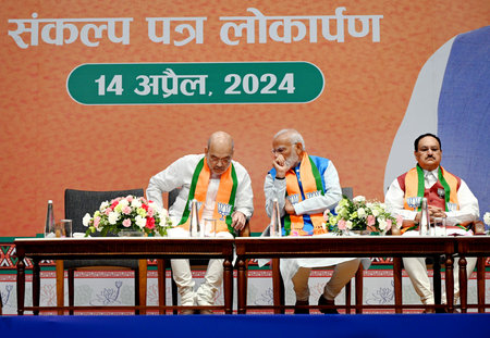 NEW DELHI, INDIA - APRIL 14: Prime Minister Narendra Modi, Home Minister Amit Shah and BJP President JP Nadda during the launch of BJP's Sankalp Patra for Lok Sabha Elections 2024 at BJP HQ, on April 14, 2024 in New Delhi, India. BJP election manifesto - のeditorial素材
