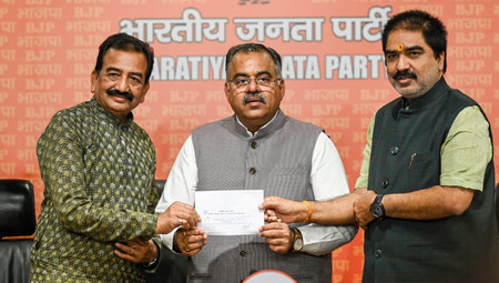 NEW DELHI, INDIA - APRIL 15: Former BJD MP Prabhas Kumar Singh joins BJP party in the presence of Tarun Chugh (BJP National General Secretary) and Prem Shukla (BJP National Spokesperson)at BJP Headquarter at DDU Marg on April 15, 2024 in New Delhi, India.のeditorial素材