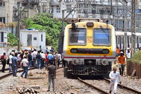 MUMBAI, INDIA - APRIL 29: Mumbai local train derailed at Harbour Line railway which was coming towards CSMT Railway station on platform no 2, on April 29, 2024 in Mumbai, India. Harbour line services continued to be a mess on Thursday, as authorities scraのeditorial素材