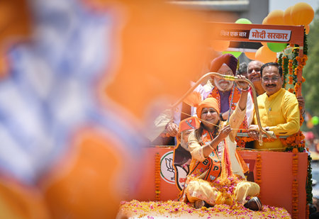 NEW DELHI, INDIA - MAY 2: Kamaljeet Sehrawat,  BJP Candidate from West Delhi Lok Sabha Constituency  seen along Virendra Sachdeva, President of Delhi BJP and Union Minister Hardeep Puri as she conducts a roadshow before filing her nomination at Vikas Puriのeditorial素材