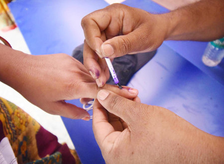 KHAGARIA, INDIA - MAY 7: Voters casting votes during 3rd phase of Lok Sabha election at a polling booth on May 7, 2024 in Khagaria, India. (Photo by Santosh Kumar/Hindustan Times)のeditorial素材
