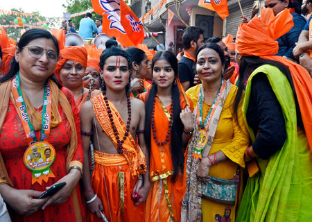 NEW DELHI, INDIA - MAY 8: Artists dressed as lord Ram Sita campaign for BJP candidate from East Delhi Lok Sabha Seat Harsh Malhotra at a Road show, in Kalyanpuri, on May 8, 2024 in New Delhi, India. (Photo by Sanjeev Verma/Hindustan Times)のeditorial素材