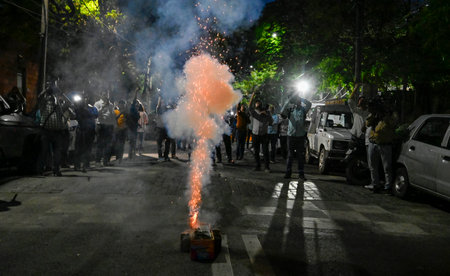 NEW DELHI, INDIA - MAY 10: AAP supporters burning Fire crackers outside delhi CM House after interim...
