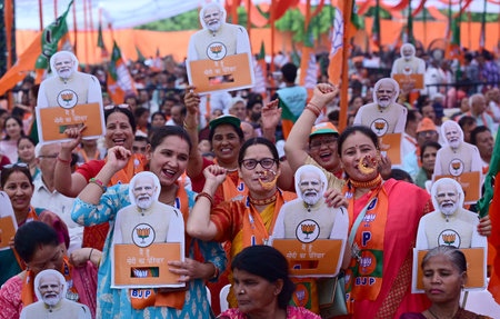 CHANDIGARH, INDIA - MAY 10:  Women supporters in traditional dressing taking part in BJP National President JP Nadda rally at sector 27  on May 10, 2024 in Chandigarh, India. (Photo by Ravi Kumar/Hindustan Times)のeditorial素材