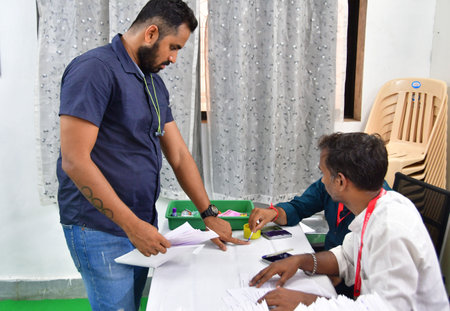 MUMBAI, INDIA - MAY 13:  Election duty staff cast their votes through postal ballot at Municipal School Mumbai Central, 31-Mumbai South Lok Sabha Constituency, ahead of the LokSabha Election, at Mumbai Central on May 13, 2024 in Mumbai, India. The 96 parlのeditorial素材