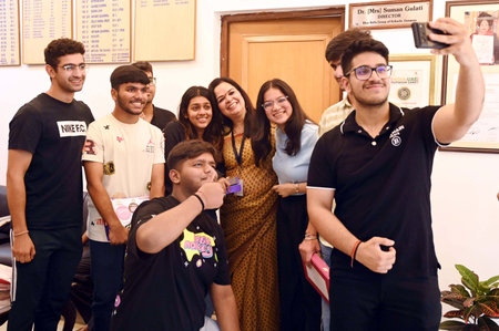 GURUGRAM, INDIA - MAY 13: Students takes a selfie with Principal Alka Singh for memories after...