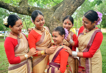 Lakhimpur, May 12, 2024 (ANI): Assamese girls wearing traditional attire during the Faat Bihu celebration, at Mohghuli Chapori in Lakhimpur District, Assam on Sunday. (ANI Photo via Hindustan Times)のeditorial素材