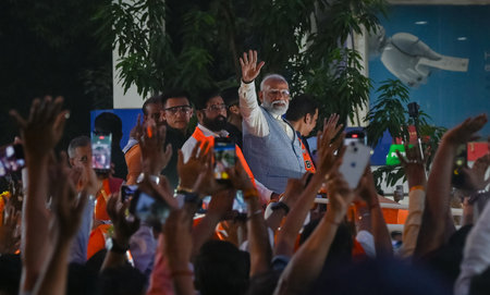 MUMBAI, INDIA - MAY 15:  Prime Minister Narendra Modi with Maharashtra Chief Minister Eknath Shinde and Deputy Chief Minister Devendra Fadnavis during a road show   at Ghatkopar on May 15, 2024 in Mumbai, India.  (Photo by Raju Shinde/Hindustan Times)のeditorial素材