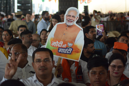 KALYAN, INDIA - MAY 15: BJP Supporters are seen for the meeting where Prime Minister Narendra Modi will be present for the Shiv Sena (Shinde camp) Kalyan and Bhiwandi BJP candidate in Kalyan Lok Sabha constituency on May 15, 2024 in Kalyan, India. (Photo のeditorial素材