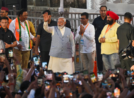 MUMBAI, INDIA - MAY 15:  Prime Minister Narendra Modi with Maharashtra Chief Minister Eknath Shinde and Deputy Chief Minister Devendra Fadnavis during a road show   at Ghatkopar on May 15, 2024 in Mumbai, India.  (Photo by Raju Shinde/Hindustan Times)のeditorial素材