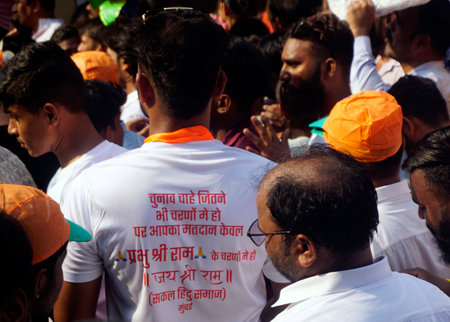 MUMBAI, INDIA - MAY 18: Supporters of Uttar Pradesh Chief Minister Yogi Adityanath during a public meeting in support of Mahayuti Mumbai North Central candidate Ujjwal Nikam at Kurla, on May 18, 2024 in Mumbai, India. (Photo by Raju Shinde/Hindustan Timesのeditorial素材