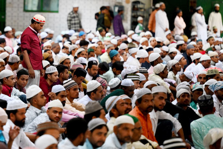 NOIDA, INDIA - JUNE 17: Muslims offer prayer (namaz) on the occasion of Eid-AL-Adha at the Sector 8 Jama Masjid, on June 17, 2024 in Noida, India. Eid-ul-Adha, also known as Bakra Eid, Bakrid, Eid al-Adha, Eid Qurban or Qurban Bayarami, is Islamic festivaのeditorial素材