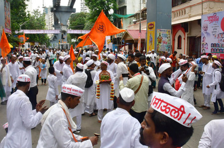 MUMBAI, INDIA - JULY 17: Hindu devotees participate in the 'Dindi' procession on the occasion of 'Ashadhi Ekadashi' at Vitthal Mandir, at Wadala on July 17, 2024 in Mumbai, India. (Photo by Bhushan Koyande/Hindustan Times)のeditorial素材