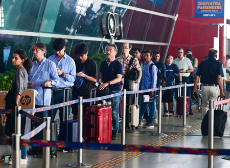 NEW DELHI, INDIA - JULY 19: Passengers seen waiting after a major disruption in Microsoft Corp.'s...