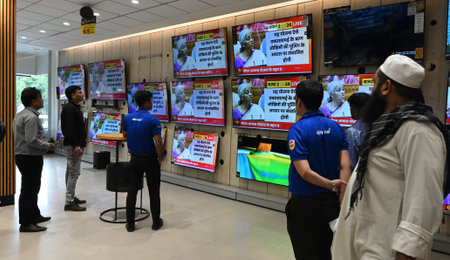 NEW DELHI, INDIA - JULY 23: People watch Union Budget 2024-25 being presented by Finance Minister...
