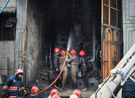 NEW DELHI, INDIA - JULY 24:  Firefighters seen trying to douse off fire gutted inside a plastic factory at Narela Industrial Area   on July 24, 2024 in New Delhi, India.  (Photo by Sanchit Khanna/Hindustan Times)のeditorial素材