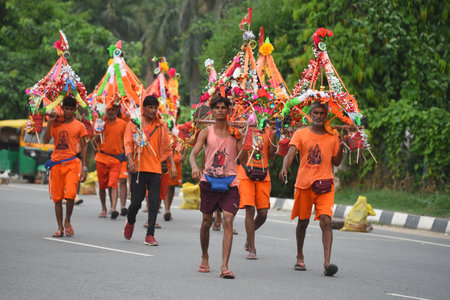 GURUGRAM, INDIA - JULY 26: Kanwariyas carrying holy water collected from River Ganga in Haridwar...