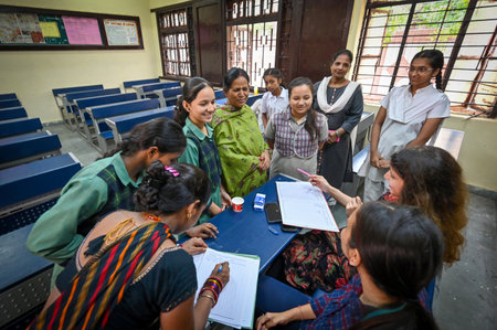 NEW DELHI, INDIA - JULY 27: Students along with their parents seen interacting with teachers during Mega PTM in the schools of Delhi Government at Swami Dayanand SKV School, Old Rajendra Nagar, on July 27, 2024 in New Delhi, India. (Photo by Sanchit Khannのeditorial素材