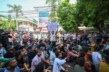 NEW DELHI, INDIA - JULY 28: Students protesting at karol Bagh after 3 students died last night, as waterlogged in basement of coaching centre in Saturday evening rain, on July 28, 2024 in New Delhi, India. Delhi's IAS coaching center on Saturday became flのeditorial素材