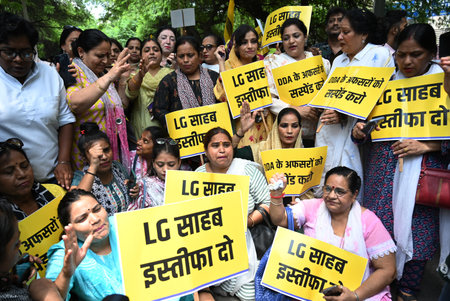 NEW DELHI, INDIA - AUGUST 3: AAP Party supporters shout slogans as they protest against Delhi LG over death of mother and son due to DDA's negligence in Mayur Vihar at LG Secretariat, on August 3, 2024 in New Delhi, India. AAP demanded resignation of Lt Gのeditorial素材