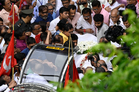 KOLKATA, INDIA - AUGUST 8:  Former chief minister of West Bengal and veteran CPI(M) leader Buddhadeb Bhattacharya passed away on Thursday morning and his mortal remains is taken out from his Palm Avenue residence and will be kept at Peace World  on Augustのeditorial素材
